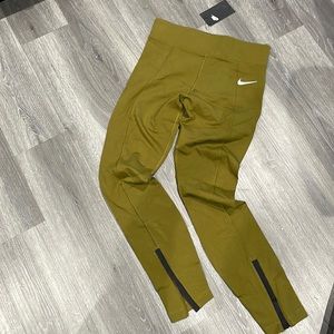 Olive green Nike pants